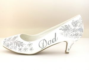 Picture of shoe with dad written om it.